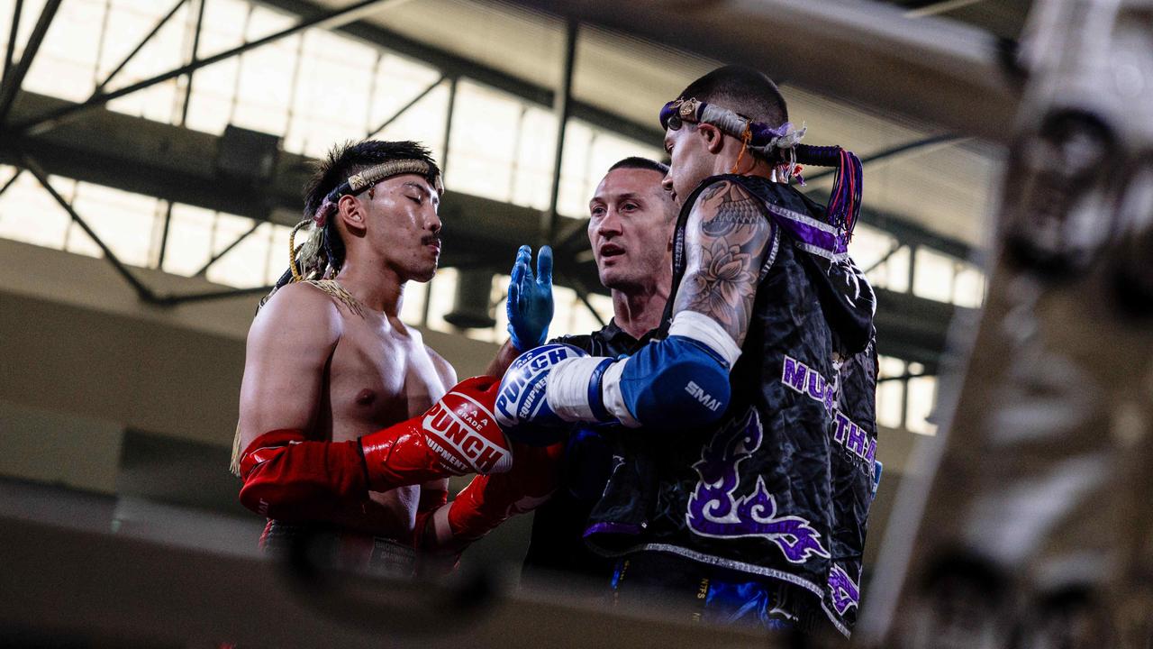 Aaron Phan (red) vs. Shaun Rundle (blue) at the NT Fight Series XI at Ventia Stadium. Picture: Pema Tamang Pakhrin