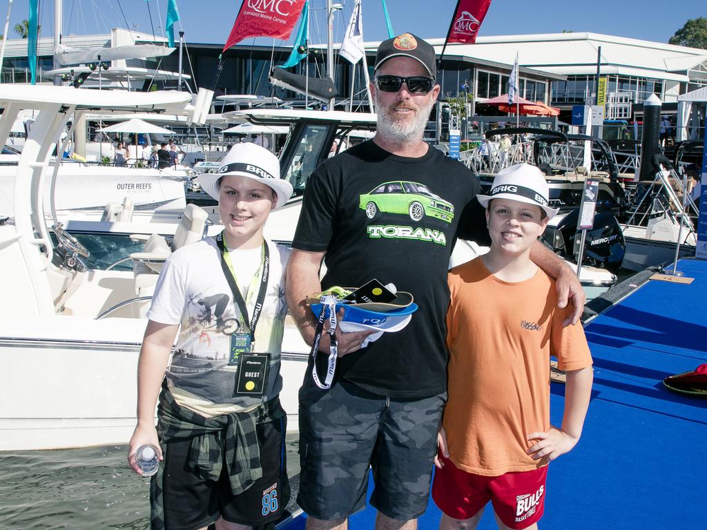 Charlie , Joe and Ryder Timmers at the Sanctuary Cove Boat Show. Picture: Glenn Campbell