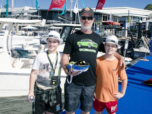 Charlie , Joe and Ryder Timmers at the Sanctuary Cove Boat Show. Picture: Glenn Campbell