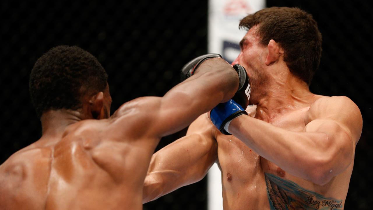 Neil Magny punches Rodrigo de Lima during the UFC Fight Night event at Vector Arena on June 28, 2014 in Auckland, New Zealand. (Photo by Josh Hedges/Zuffa LLC/Zuffa LLC via Getty Images)