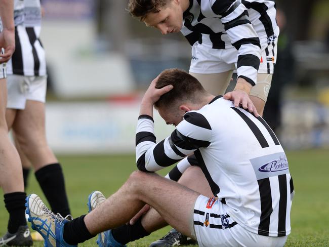 Ryan Quirk is dejected after Narre’s 2018 grand final loss to Berwick.