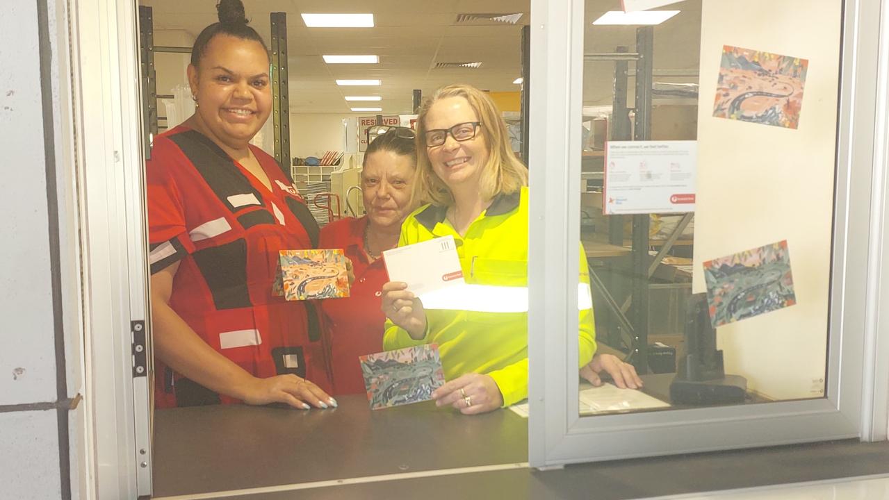 The Roma Post Office team showing their support for the 'Connection Postcards' initiative, which aims to connect rural Australians and combat loneliness. Picture: Supplied.