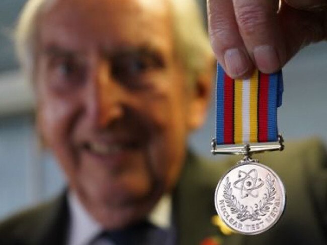 John Robinson holding the Nuclear Test Medal Picture: Supplied