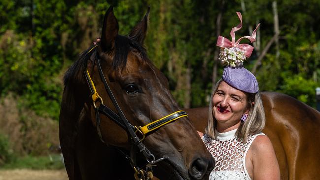 Cairns Jockey Club Committee member Alaina Anderlini with Voltaic; trained by Rodney Miller. Picture: Emily Barker