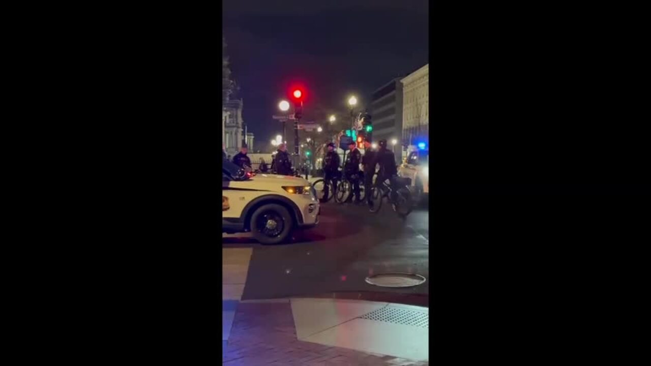 Police Guard Security Barriers as DC Prepares for Trump Inauguration