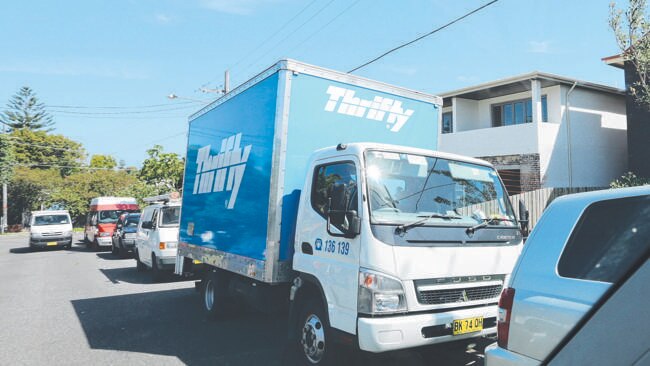 A Thrifty van at the scene this week, as the family slowly remove rubbish from their overflowing Bondi property.