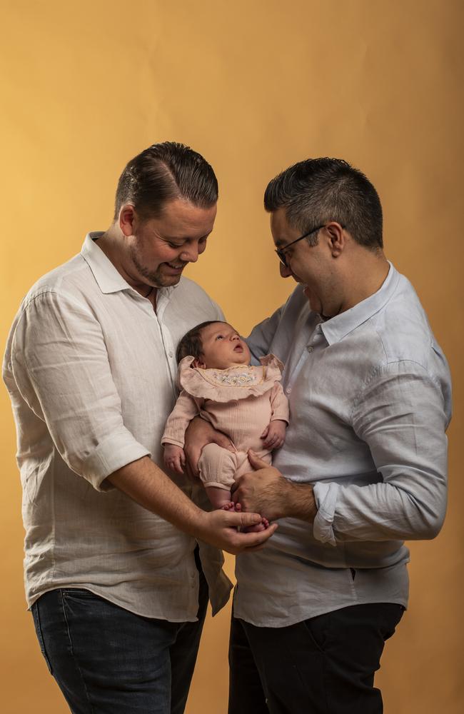 Baden and Nelson Marino-Hall with baby Amalia. Picture: Mark Cranitch