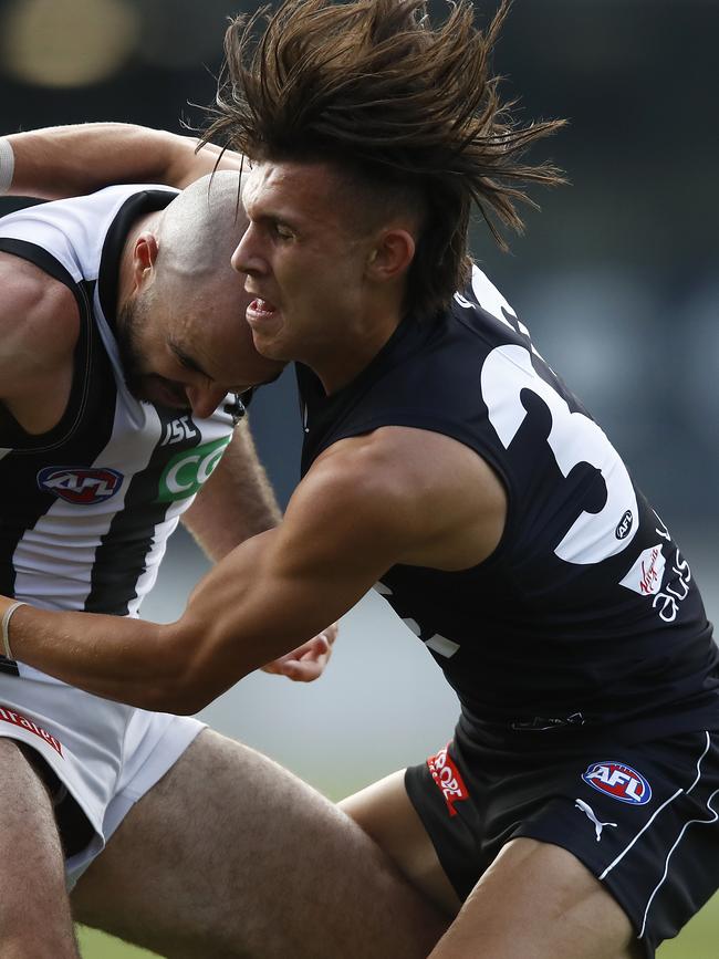 New Panther Sam Ramsay tackles Collingwood’s Steele Sidebottom while playing for Carlton. Picture: Daniel Pockett/Getty Images