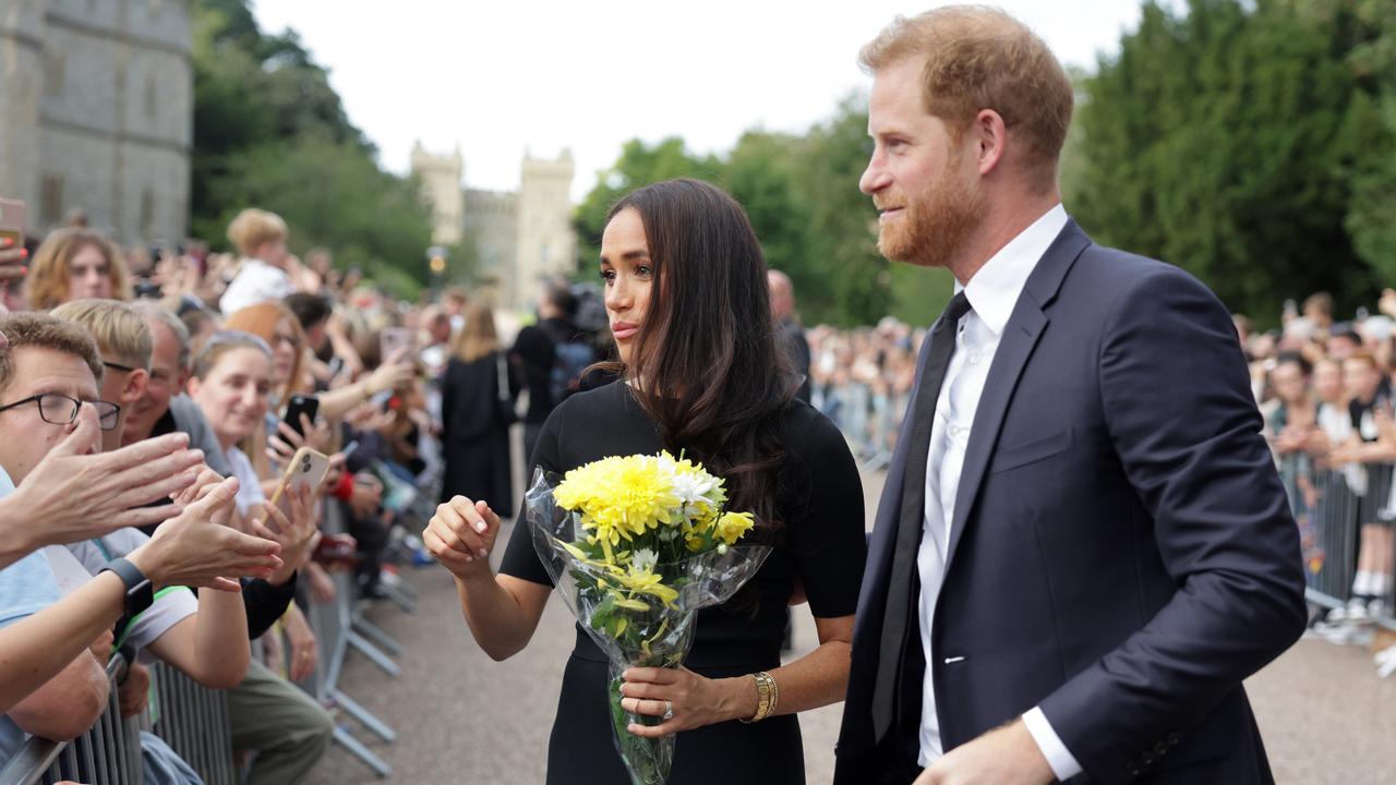 Meghan Duchess of Sussex and Prince Harry, Duke of Sussex speak with wellwishers at Windsor Castle. Picture: Chris Jackson – WPA Pool/Getty Images