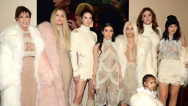 Jenner (second from right) with his family: Kris Jenner (l to r), Khloe Kardashian, Kendall Jenner, Kourtney Kardashian, Kim Kardashian, North West and Kylie Jenner. Picture: Getty