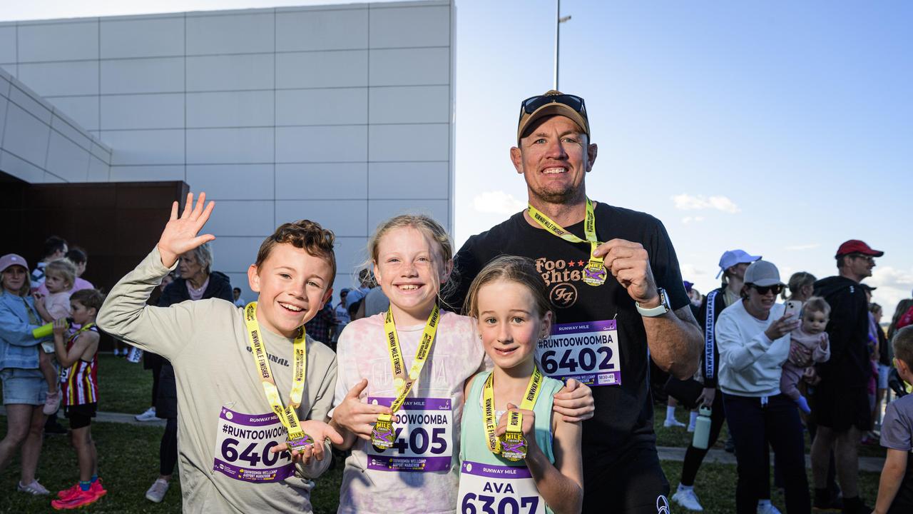 Runway Mile finishers (from left) Henry McGaw, Matilda McGaw, Ava Magarey and Greg McGaw at the Toowoomba Marathon events at Wellcamp Airport, Saturday, May 3, 2025. Picture: Kevin Farmer