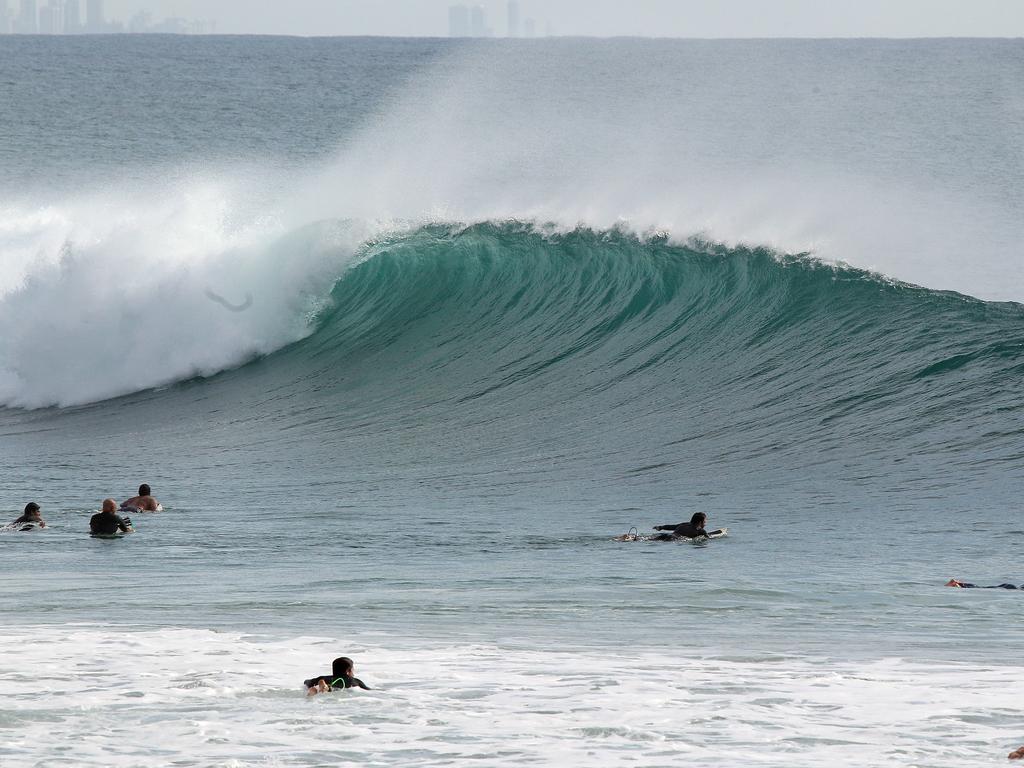 Surfers pictured enjoying good swell and near perfect waves at Snapper Rocks. Picture: Mike Batterham