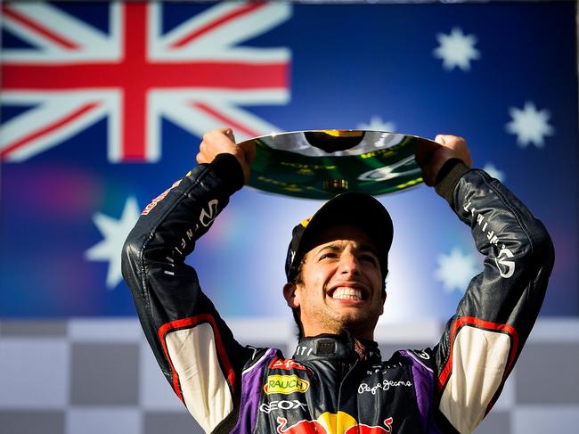 Daniel Ricciardo of Australia celebrates finishing second, before later being disqualified in the 2014 Grand Prix. Picture: Vladimir Rys Photography/Getty Images