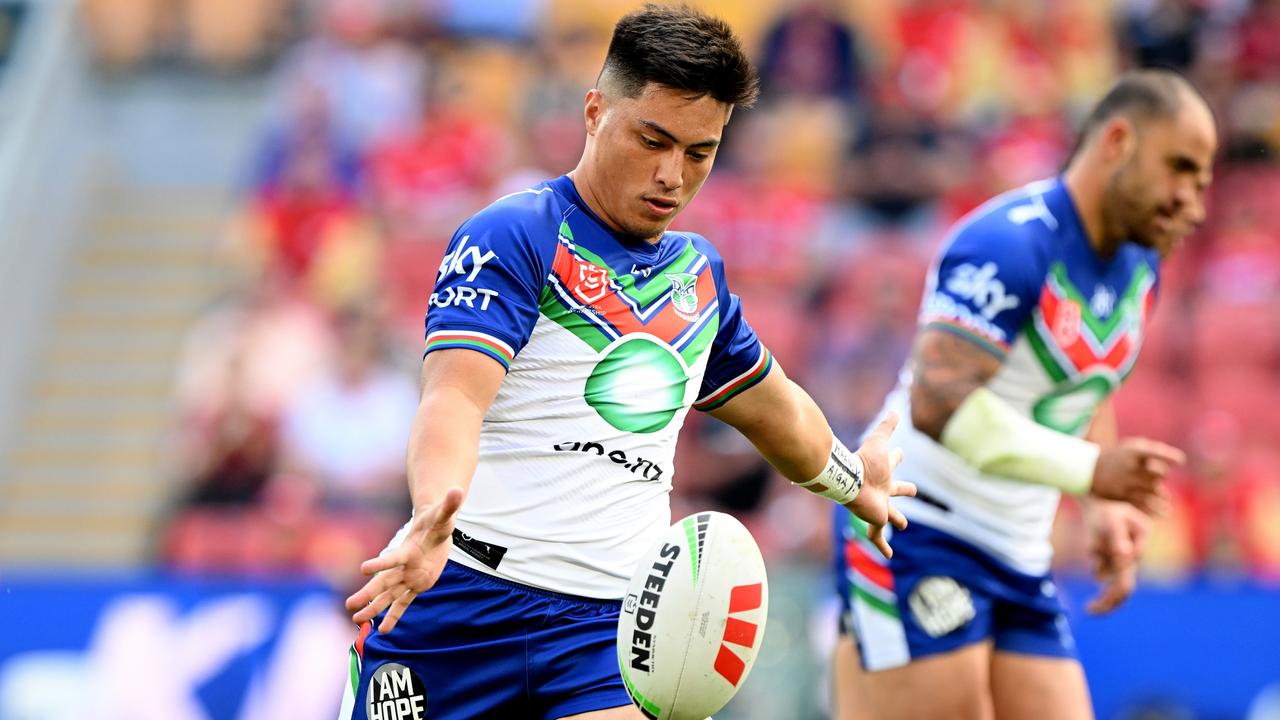 BRISBANE, AUSTRALIA - SEPTEMBER 02: Ronald Volkman of the Warriors kicks the ball during the round 27 NRL match between the Dolphins and New Zealand Warriors at Suncorp Stadium on September 02, 2023 in Brisbane, Australia. (Photo by Bradley Kanaris/Getty Images)