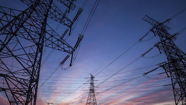 The silhouette of the evening electricity transmission pylon. Istock