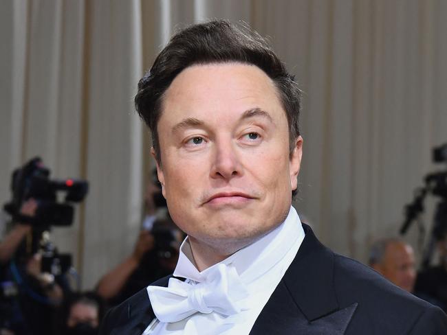 FILES) In this file photo taken on May 02, 2022, Elon Musk arrives for the 2022 Met Gala at the Metropolitan Museum of Art in New York. - US billionaire Elon Musk was embroiled in a social media spat with Ukrainian officials including President Volodymyr Zelensky on October 3, 2022, over his ideas on ending Russia's invasion. (Photo by Angela Weiss / AFP)