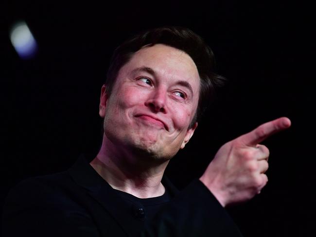 (FILES) In this file photo taken on March 14, 2019, Tesla CEO Elon Musk speaks during the unveiling of the new Tesla Model Y in Hawthorne, California. - Elon Musk's decision to pull Twitter off the stock market allows him to make major changes quickly, but it also takes the company more heavily into debt, a risky choice for a money-losing business. (Photo by Frederic J. BROWN / AFP)