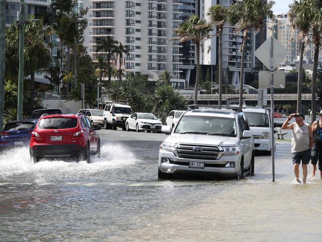 Flooding from the King tide at Budds Beach at Surfers Paradise was made worse by the approaching storm system. Picture Glenn Hampson