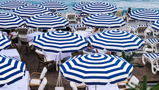 A Gold Coast cafe could be up for a massive bill after an umbrella allegedly fell on a patron's head.