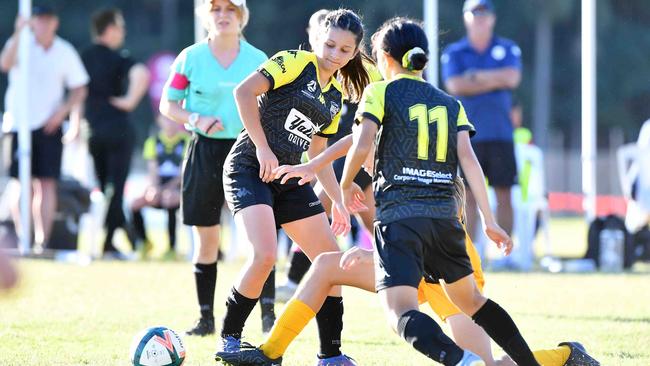 SOCCER: Junior football carnival, Maroochydore. Sunshine Coast Wanderers V Logan Lighting Maroon, junior girls. Picture: Patrick Woods.