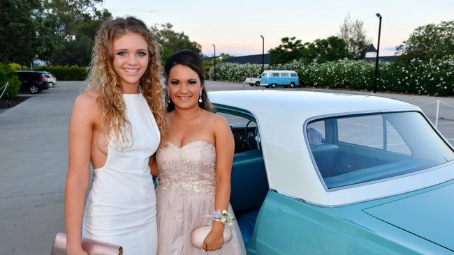 Allie Hicks and Jacey Washington turn up in style at the Roma State College formal. Photo Tom Gillespie / Western Star