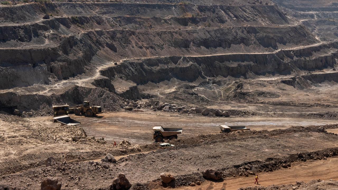 Trucks haul away ore from a pit in Tenke Fungurume Mine, one of the largest copper and cobalt mines in the world, owned by Chinese company CMOC, in southeastern Democratic Republic of Congo. Picture: Emmet LIVINGSTONE / AFP