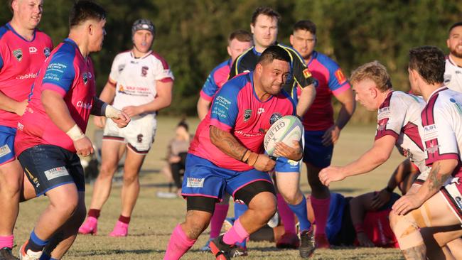 GCDRU (Gold Coast Rugby) first grade clash between Helensvale Hogs (pink) and Nerang Bulls. (white). Frankie Kawana. Pic Mike Batterham