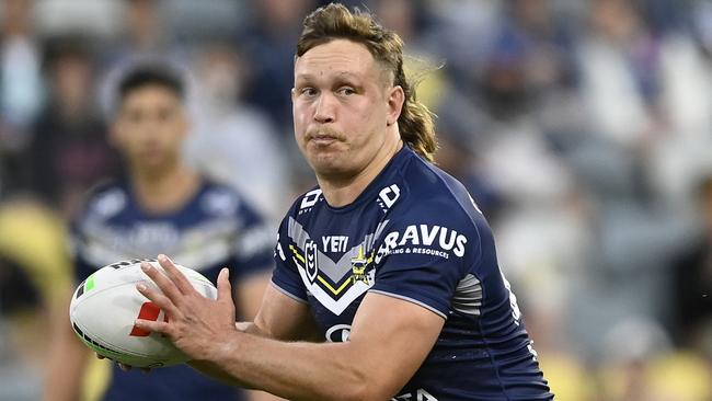 TOWNSVILLE, AUSTRALIA - JUNE 08: Reuben Cotter of the Cowboys runs the ball during the round 14 NRL match between North Queensland Cowboys and New Zealand Warriors at Qld Country Bank Stadium, on June 08, 2024, in Townsville, Australia. (Photo by Ian Hitchcock/Getty Images)