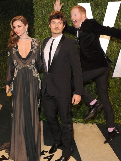 Miranda Kerr, Orlando Bloom and Jesse Tyler Ferguson attend the 2013 Vanity Fair Oscar party on February 24, 2013 in West Hollywood, California. Picture: Getty