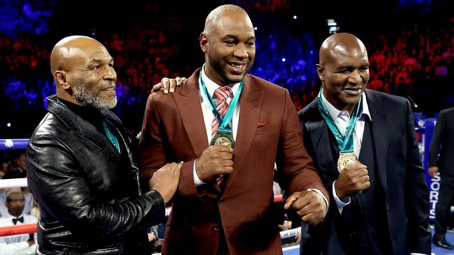 Former heavyweight champions Mike Tyson, Lennox Lewis and Evander Holyfield together prior to the Tyson Fury-Deontay Wilder fight in February. Picture: Al Bello/Getty Images