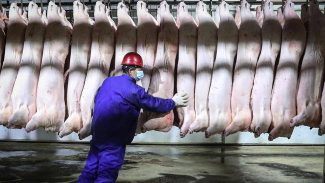 A pork production line at a food factory in Shenyang, in China's Shenyang province. Picture: AFP