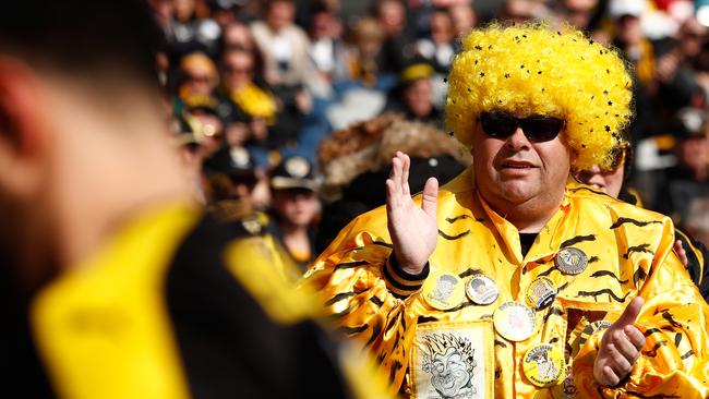 An avid Tigers fan cheering. Picture: Adam Trafford