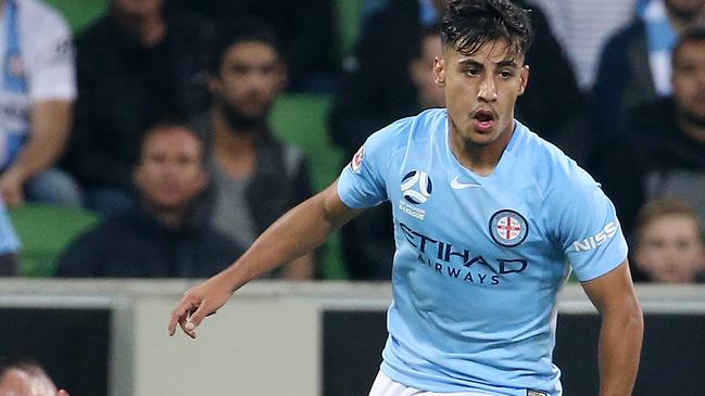 A-League elimination final. 20/04/2018. Melbourne City v Brisbane Roar at AAMI Park, Melbourne. Melbourne City's Daniel Arzani gets around Ivan Frantic of the Brisbane Roar. Pic: Michael Klein