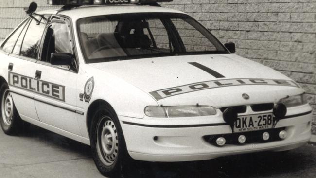 SUNDAY TELEGRAPH SPECIAL. Highway patrol nsw Police car, Commodore.