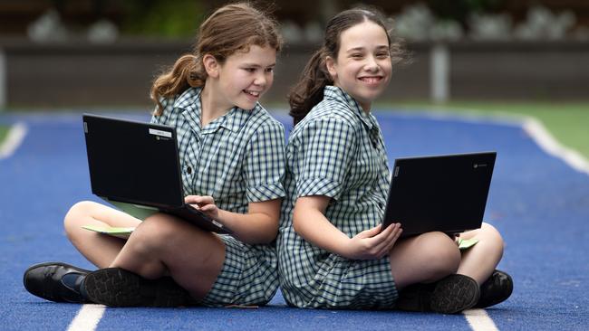 MELBOURNE AUSTRALIA - DECEMBER 14TH 2023 : Literacy captains for 2024, Ava Holdsworth and Chloe Carlyon, both celebrate great results for their NAPLAN this year, at St Finbars Primary School, Brighton East.PICTURE : Nicki Connolly