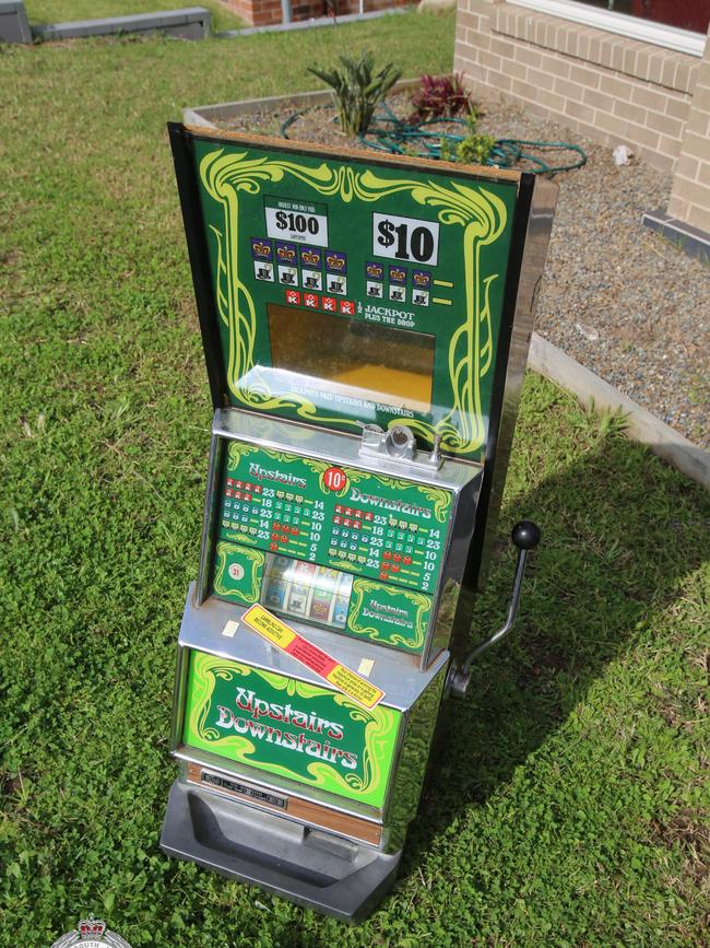 A poker machine was allegedly uncovered. Picture: NSW Police