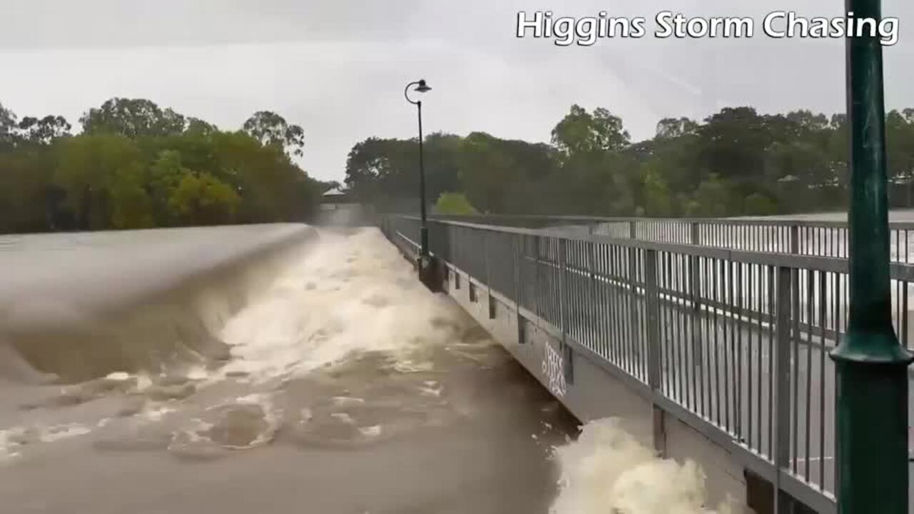 Water rushes over Aplin Weir in Townsville