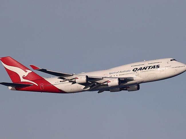 SYDNEY, AUSTRALIA - JULY 22: A Qantas Boeing 747-400, registration VH-OEJ,  passes over Sydney's Eastern Suburbs as it departs Sydney on its final flight on July 22, 2020 in Sydney, Australia. Qantas has farewelled the Boeing 747 jumbo jet from its fleet of aircraft, with the final 747-400 flight departing Sydney today. (Photo by Ryan Pierse/Getty Images)