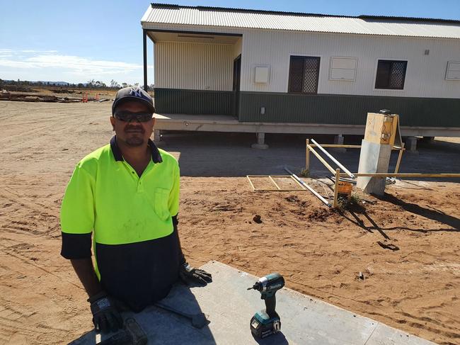 Chief Minister, Michael Gunner, Minister Remote Housing and Town Camps, Chansey Paech with Murray River North Operations Manager, Ross McLellan with former Sentenced to a Job participant turned apprentice Cameron Button.