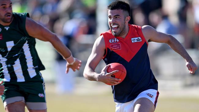 Tullamarine’s Steven Vocale looks for an option. Picture: Andy Brownbill