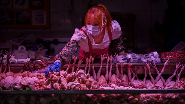 An investigation will look at whether COVID-19 originated from a wet market or whether the naturally-­occurring virus may have been released from the level four laboratory in Wuhan. Picture: Getty