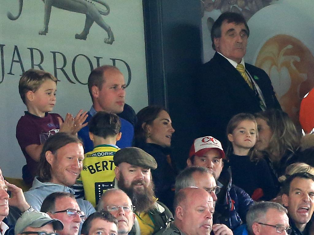 Prince George, Prince William, Kate and Princess Charlotte are seen in the stands during the Premier League match between Norwich City and Aston Villa on October 5. Picture: Stephen Pond/Getty Images