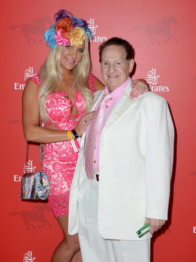 The then-couple at the Melbourne Cup Birdcage in 2013.