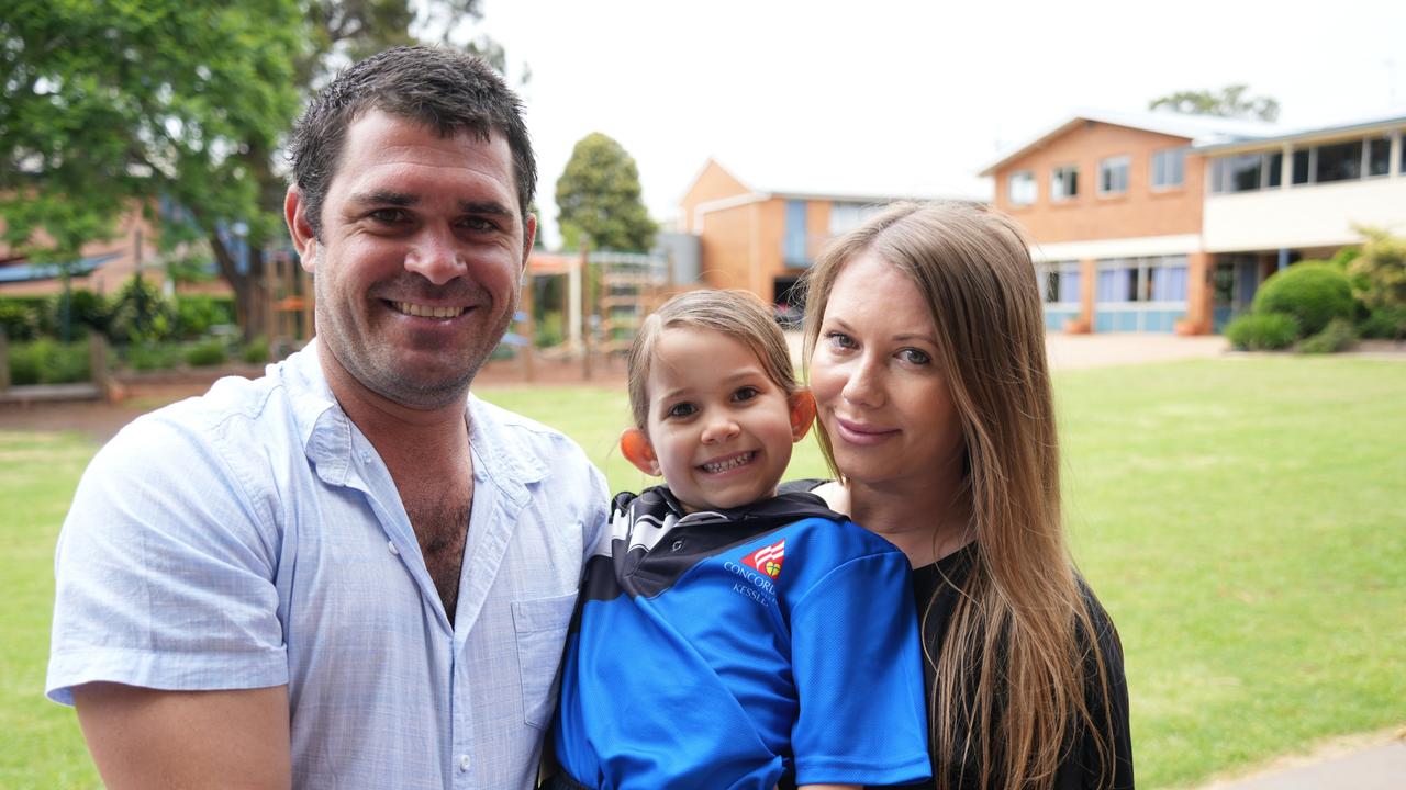 The first day of school for Concordia Lutheran College's 2023 prep students. Isla White with parents Ralana and Travis.