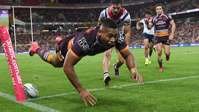 Jamayne Isaako of the Broncos is airborne after scoring a try during the Round 11 NRL match between the Brisbane Broncos and the Sydney Roosters at Suncorp Stadium in Brisbane, Friday, May 18, 2018. (AAP Image/Dan Peled) NO ARCHIVING, EDITORIAL USE ONLY