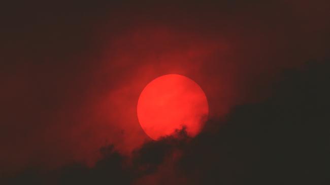 Bushfire sun near Castle Forbes Bay in the Huon. Picture: NIKKI DAVIS-JONES