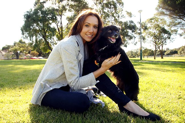 <p>Kyly Boldy with her dog 'Poochie' at a park in Leichhardt, Sydney. Kyly fronted the World Society for the Protection of Animals campaign. Picture: Sam Ruttyn</p>