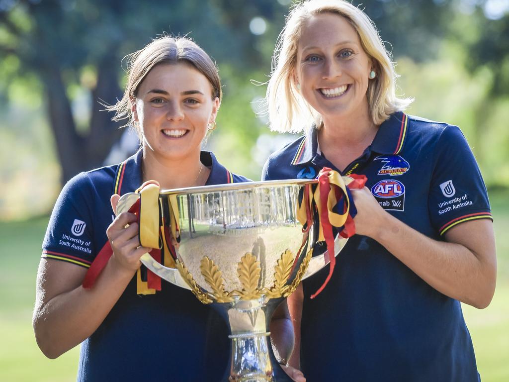 Ebony Marinoff and Marijana Rajcic took the Crows’ third premiership cup on tour in May. Picture: Roy VanDerVegt