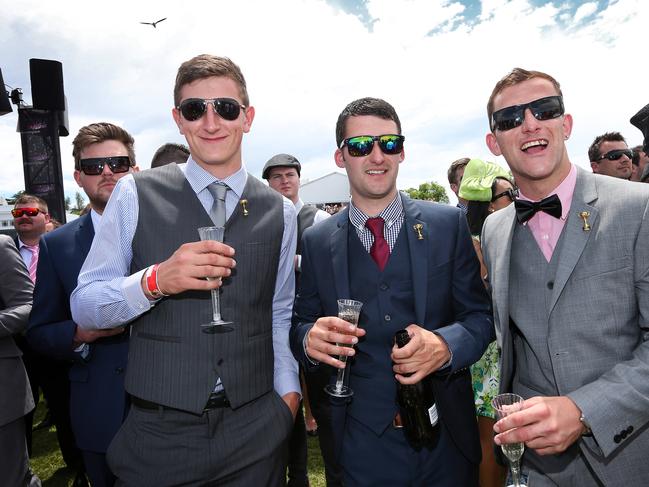 Melbourne Cup Day 2014 at Flemington Racecourse. Race fans enjoy the atmosphere on the lawn. Picture: Mark Stewart