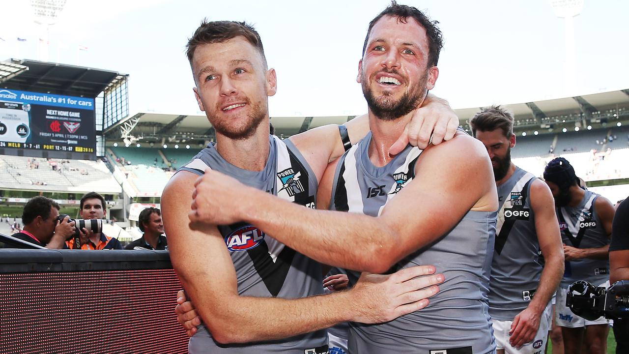 Robbie Gray of the Power (L) celebrates the win. (Photo by Michael Dodge/Getty Images)